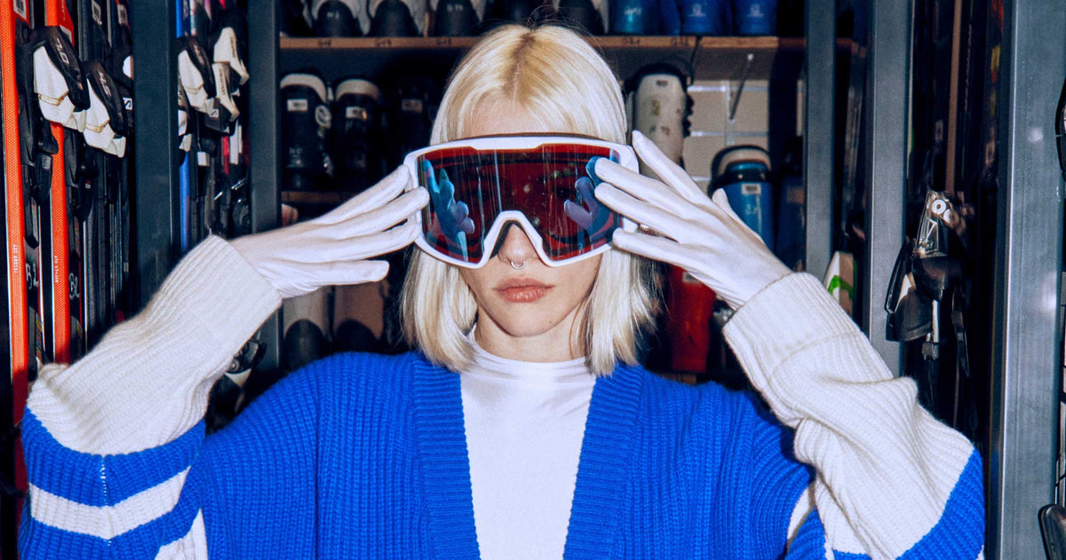Model in ski goggles and a Tomboy cardigan, from a Shopify store designed by Medito, a London Shopify agency