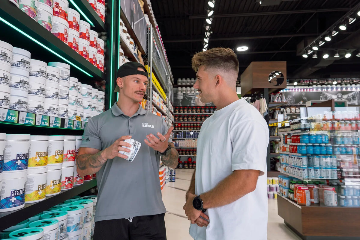 Shop Santé staff member advising a customer in one of their stores